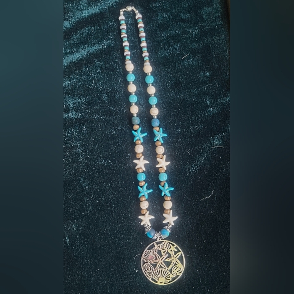 Ocean-Inspired Necklace with Starfish and Shell Pendant